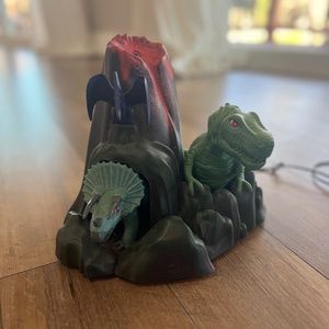 Young Living Dinosaur Diffuser with motor and cord.